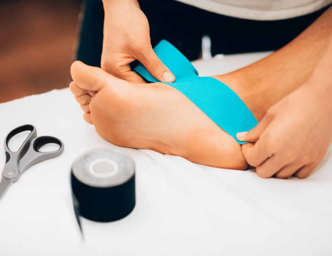 Kinesio taping for a sports injury at Herner Chiropractic in Nashua, NH